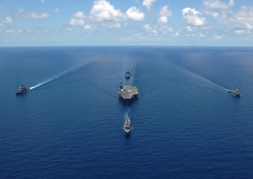 Aerial bow view of George Washington Carrier Strike Group in formation for photo exercise  N S  x